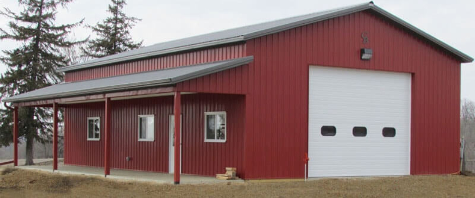 red residential pole barn garage shop