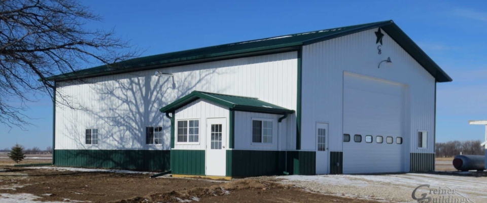 large white and green insulated pole barn