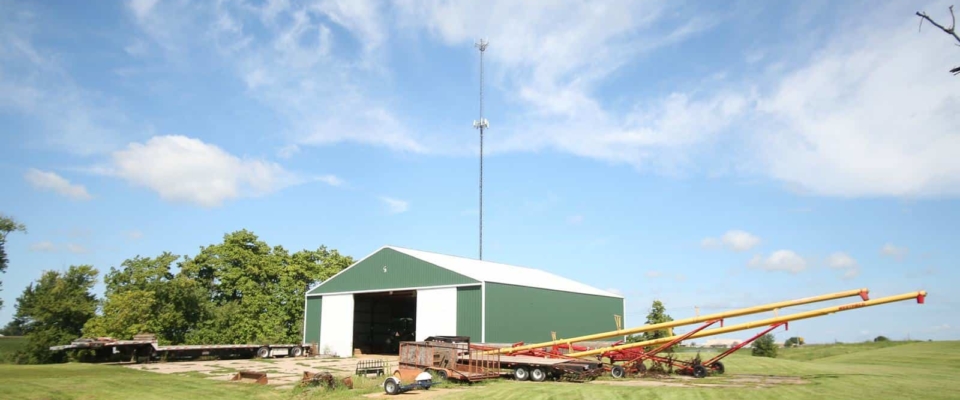 green machine shed farm equipment storage