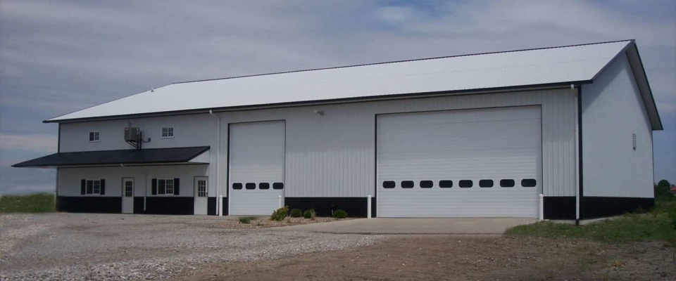 white insulated pole barn shop with office space