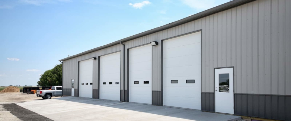 gray post frame commercial building