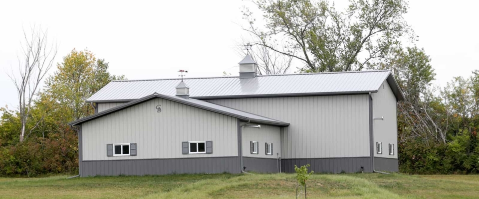 large white and gray pole barn garage shop
