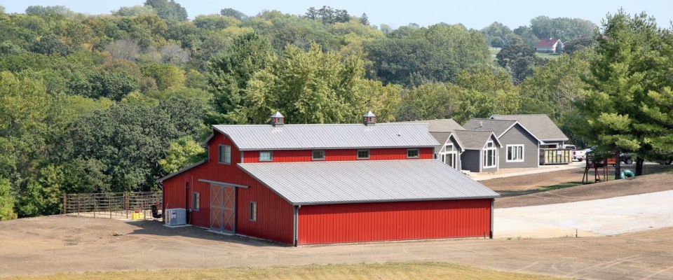 large red equestrian barn