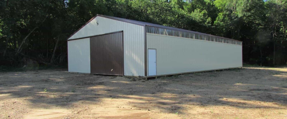 tan and brown machine shed for farm storage