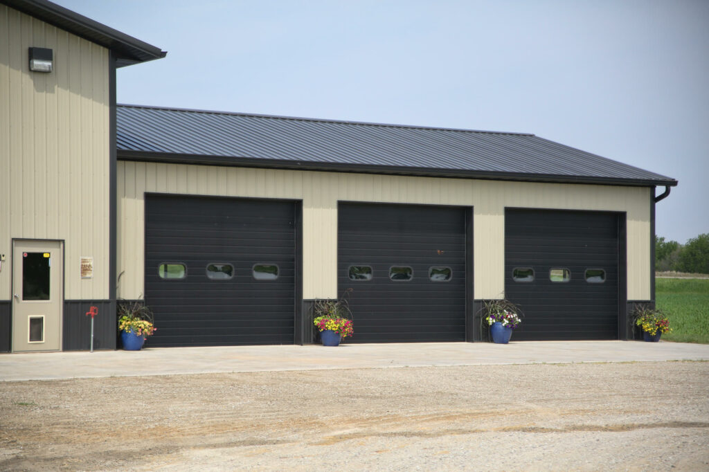 closeup of pole building doors new farm building Greiner Buildings Rossiter-lined-insulated-shop-exterior-doors