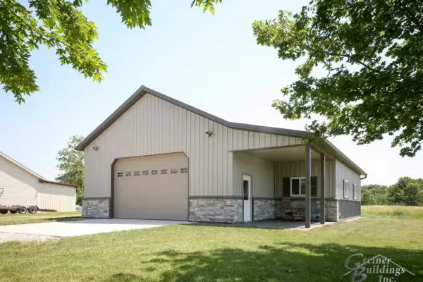 signature-series-tan-pole-barn-garage-with-covered-side-porch-stone-accent