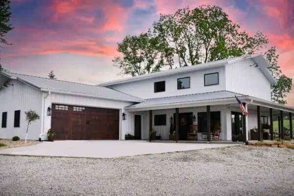 signature-series-white-barndominium-shouse-wrap-around-porch-wood-garage-door