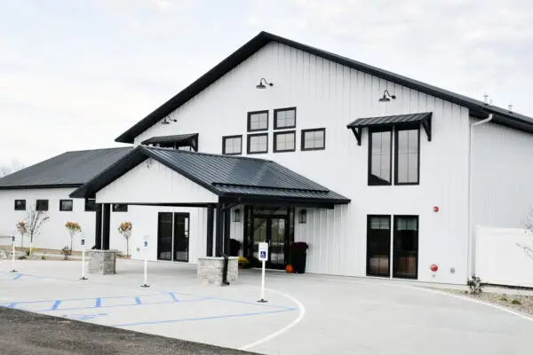 signature-series-white-commercial-pole-barn-building-covered-entrance-porte-cochere